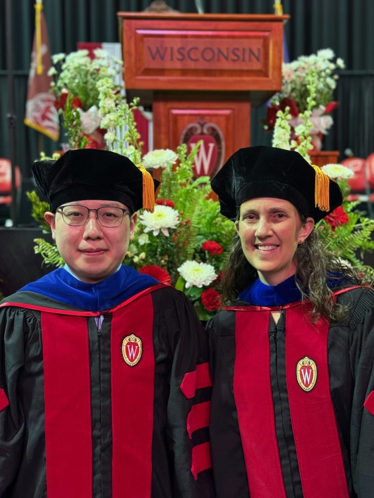 Picture of Dr. Corinne Engelman and Dr. Yuexuan Xu at graduation.
